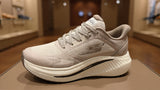 Modern beige comfort sneaker with elevated sole for everyday walking