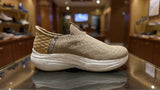 Minimalist beige sock-style sneaker featuring textured knit upper and white platform sole