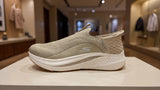 Light beige comfort slip-on shoe featuring soft fabric and flexible outsole