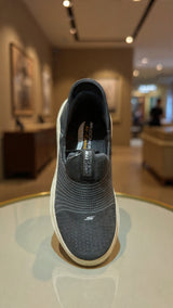 Black knit slip-on sneaker with extra thick comfort sole