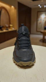 Pair of black outdoor sports shoes featuring rugged sole
