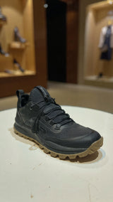 Pair of black outdoor sports shoes featuring rugged sole