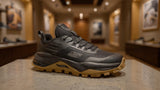Pair of black outdoor sports shoes featuring rugged sole