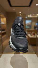 Men’s black outdoor running sneaker featuring breathable mesh upper and durable grip sole