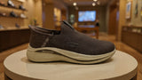 Modern brown knitted slip-on shoe designed for everyday comfort and easy wear
