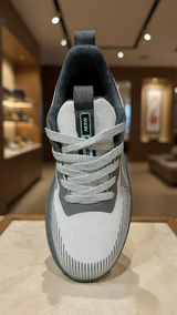 Breathable grey sports sneakers close-up