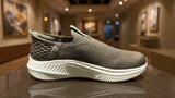 Lightweight slip-on walking shoe with breathable fabric and thick comfort outsole