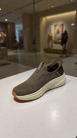 Lightweight slip-on walking shoe with breathable fabric and thick comfort outsole