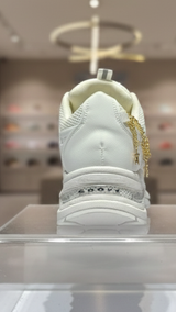 Gold chain detail on kids white sneaker