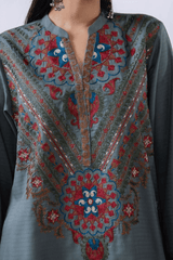 Traditional Pakistani embroidered kurta with wide leg trousers