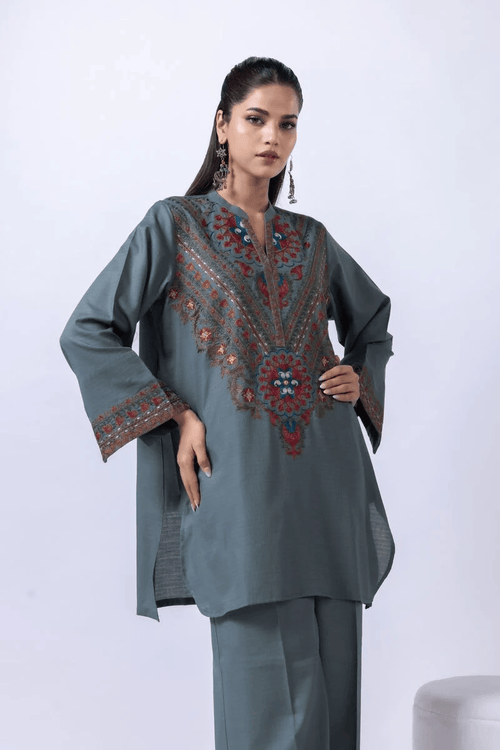 Woman wearing grey green embroidered kurta with matching palazzo trousers, Pakistani women traditional outfit