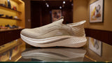 Beige slip-on knit walking shoe with breathable upper and cushioned sole