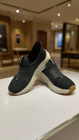 Modern casual shoe featuring ribbed fabric and platform base