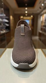 Modern brown knitted slip-on shoe designed for everyday comfort and easy wear