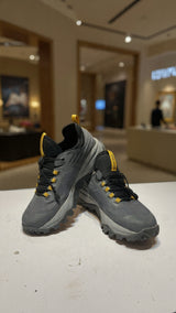 Modern grey athletic sneaker designed for outdoor trails with durable grip