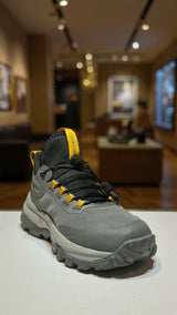 Modern grey athletic sneaker designed for outdoor trails with durable grip