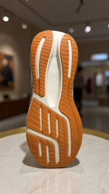 Modern casual slip-on sneaker featuring textured knit upper and supportive midsole