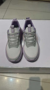 Lightweight cushioned running shoes available in purple-grey and light green.
